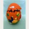 Κεραμικό Πασχαλινό Αυγό. έντονο πορτοκαλί χρώμα και πολύχρωμα σχέδια με παπάκια και πεταλούδες. Το πάνω μέρος του αυγού ανοίγει.