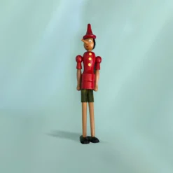 Vintage Πινόκιο που είναι κατασκευασμένο εξ ολοκλήρου από ξύλο, με κινητά μέλη στα χέρια και τα πόδια.